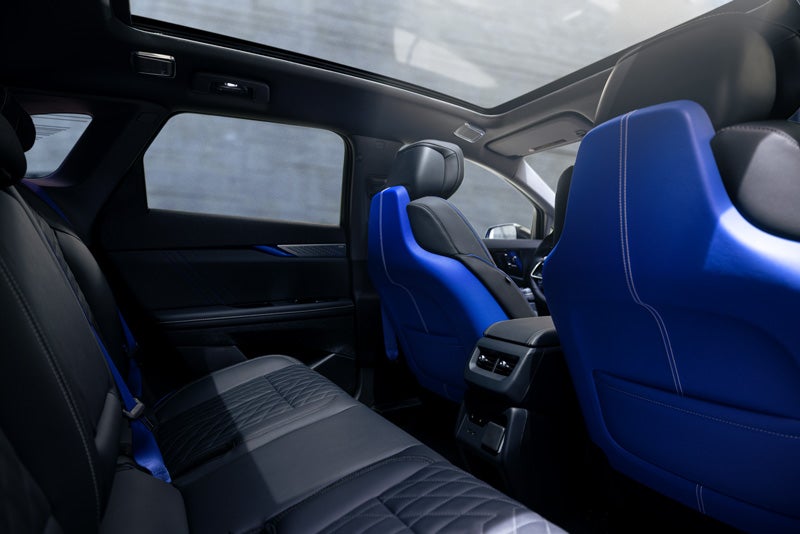 Back Seat View of the 2026 OPTIQ-V Blue Front Seats, Sun Roof, and Interior | Marvin K. Brown Cadillac in San Diego CA